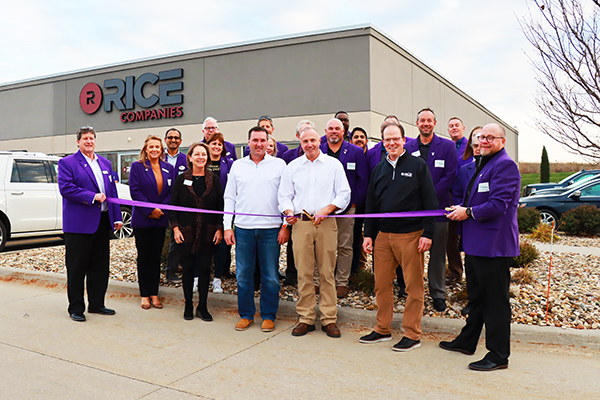 Group of professionals at ribbon cutting ceremony