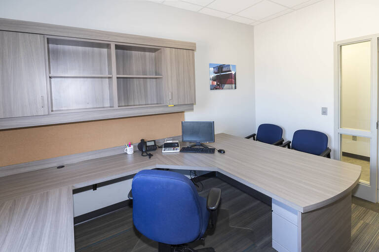 Personal office interior with guest seating